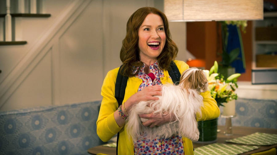Unbreakable Kimmy Schmidt Kimmy Holding Dog Wallpaper