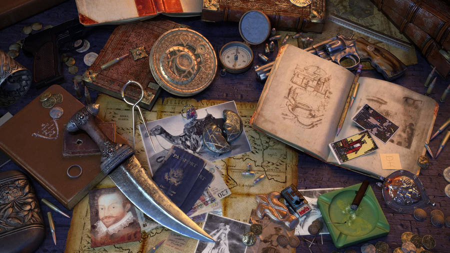 Uncharted Game Books And Artefacts Wallpaper