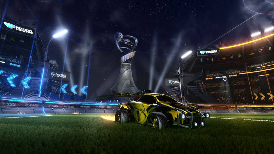 Unleash Speed And Adrenaline With A Heart-pumping Rocket League Match Wallpaper