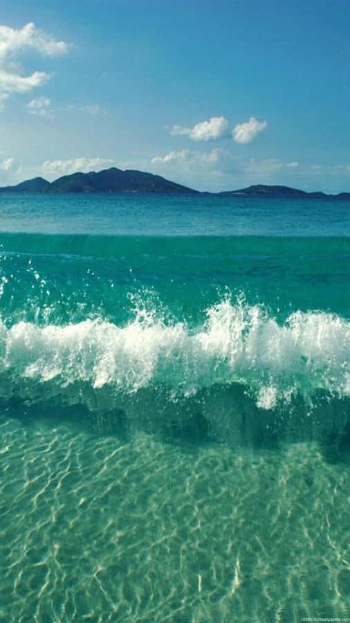 Unplug From Your Daily Routine And Relax At The Beach With Your Phone Wallpaper