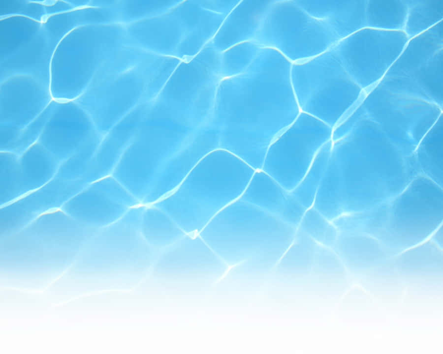 Unruffled Serenity Of A Crisp Blue Pool Wallpaper