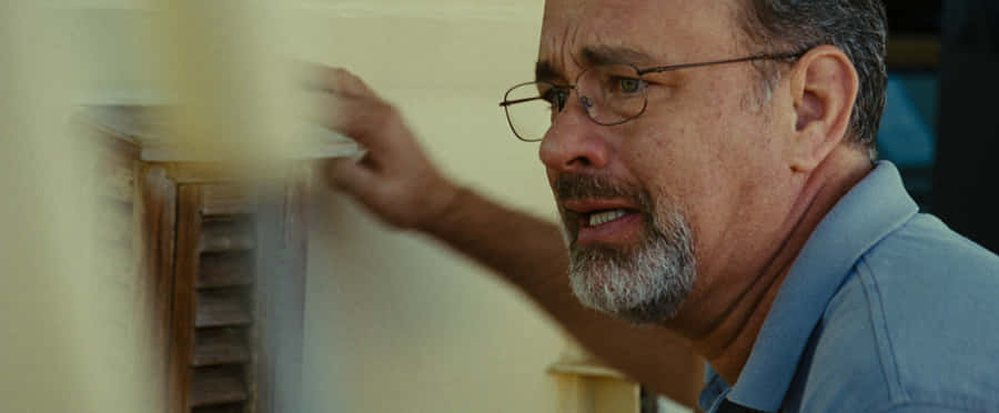 Unwavering Captain Phillips Facing The Unforeseen Danger Wallpaper
