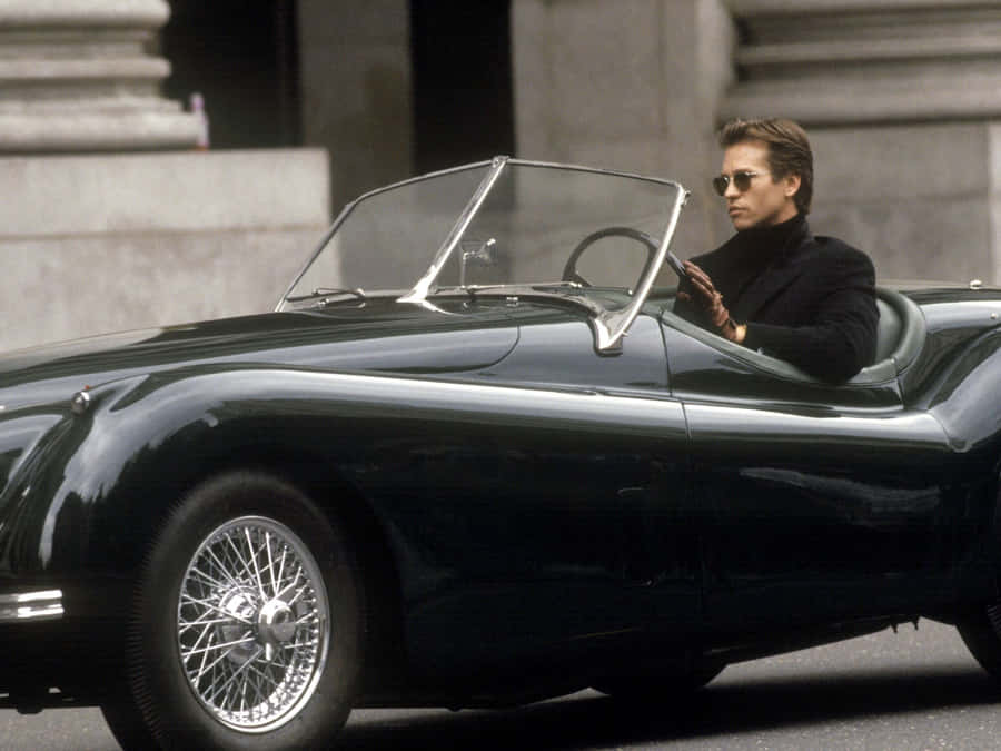 Val Kilmer Classic Car Drive Wallpaper