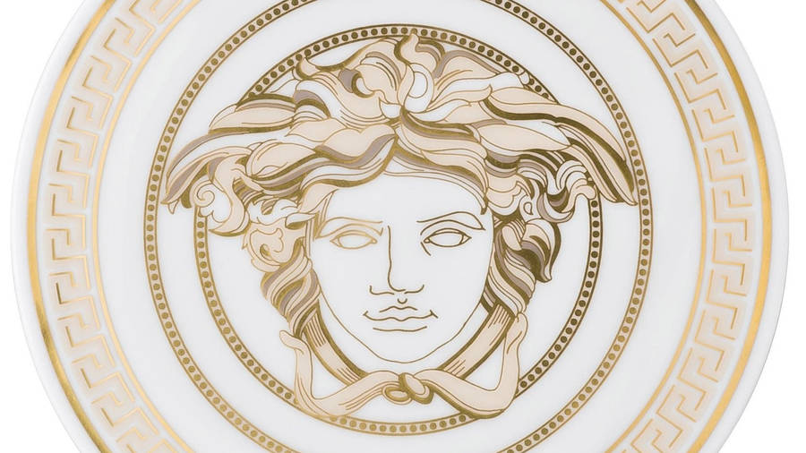 Versace Plate Golden Logo Design Wallpaper
