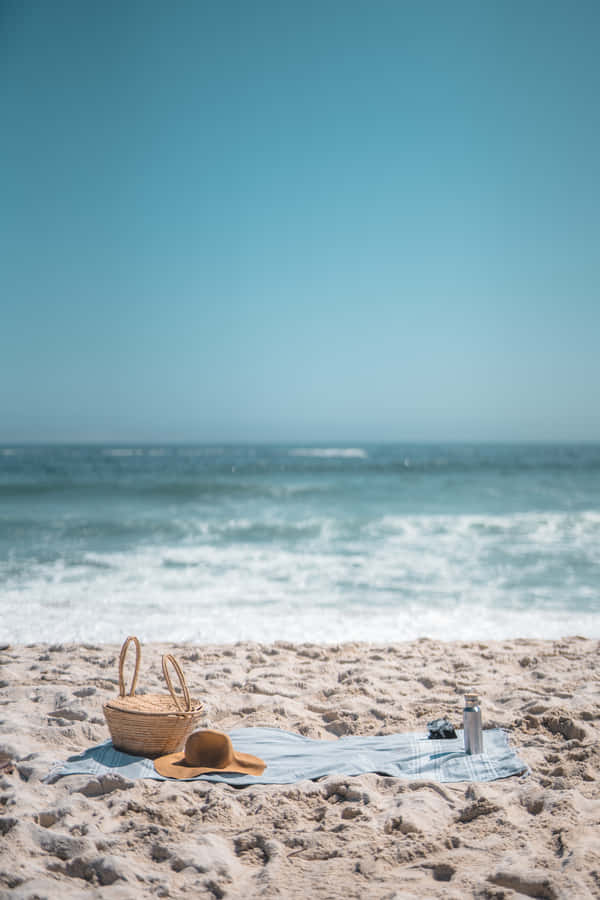 Vibrant Beach Picnic On A Sunny Day Wallpaper