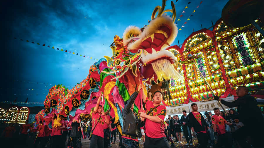 Vibrant Dragon Dance Celebration Wallpaper