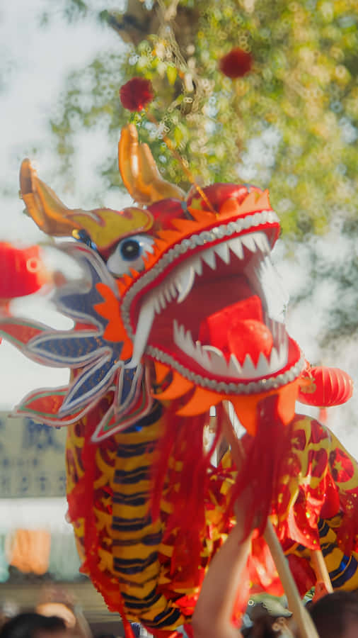 Vibrant Dragon Dance Performance Wallpaper