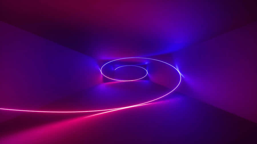 Vibrant Fluorescent Colors Blending Against A Dark Background Wallpaper