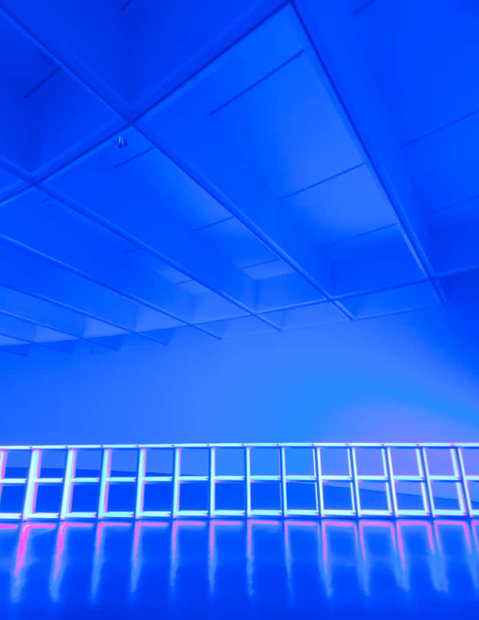 Vibrant Fluorescent Colors Blending Together In An Abstract Pattern Wallpaper