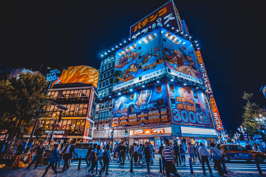 Vibrant Neon Cityscape At Night Wallpaper