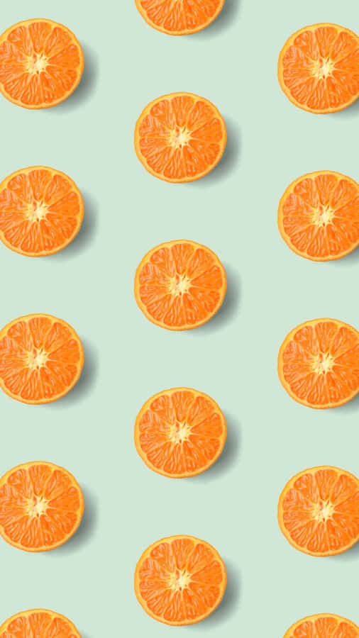 Vibrant Orange Slices Pattern Wallpaper