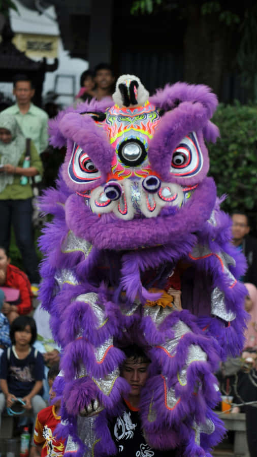 Vibrant Purple Lion Dance Wallpaper