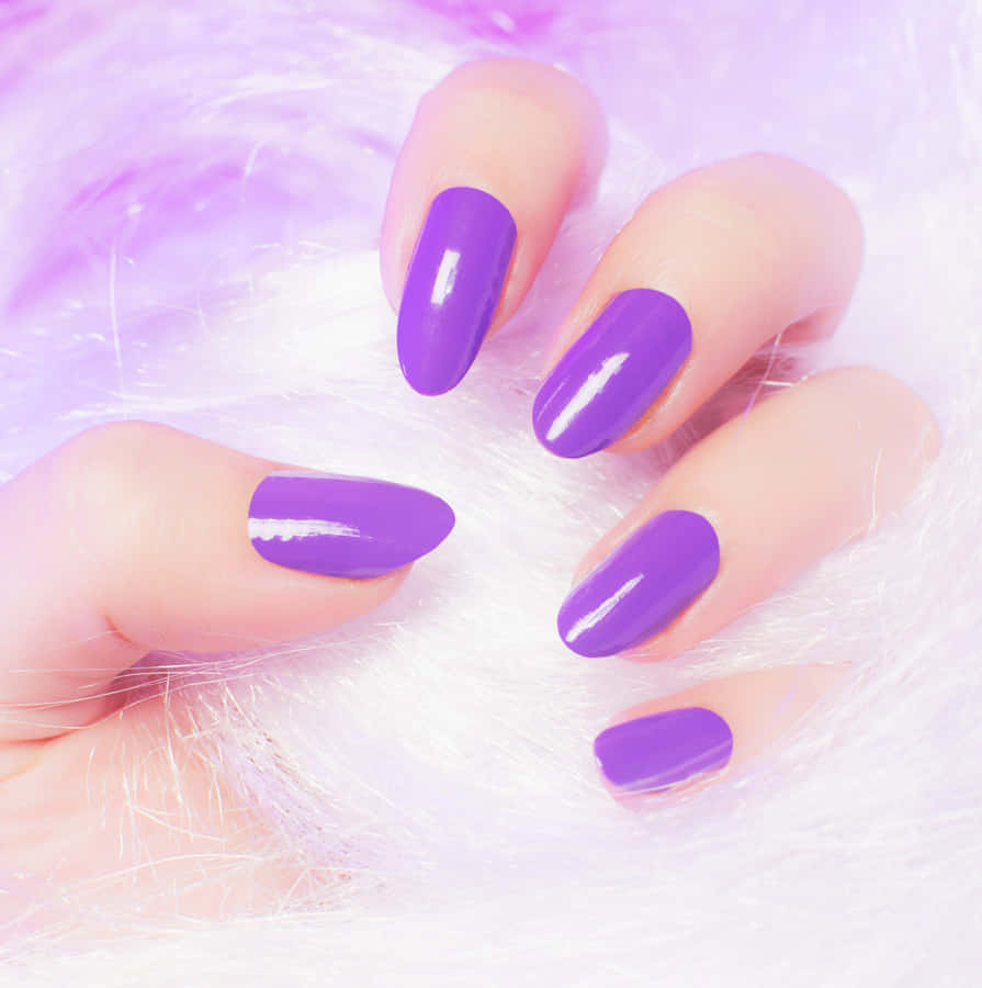 Vibrant Purple Manicureon Plush Background Wallpaper
