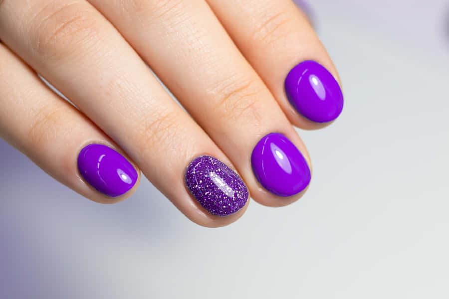 Vibrant Purple Manicurewith Accent Glitter Nail Wallpaper