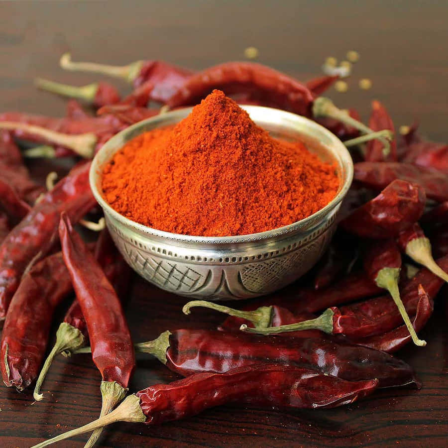 Vibrant Red Chili Powder Close-up Wallpaper