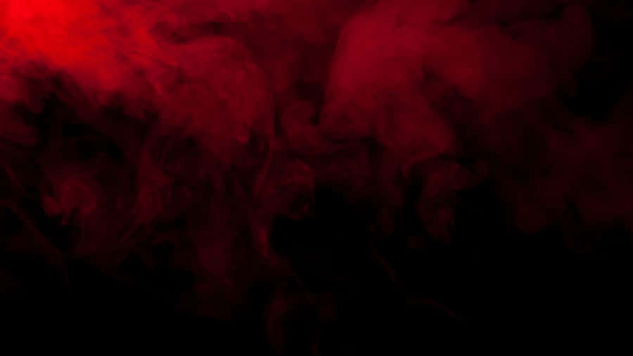 Vibrant Sunset Over Mountainous Landscape Wallpaper