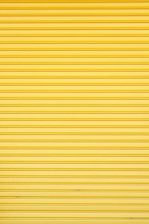 Vibrant Yellow Geometric Pattern Wallpaper