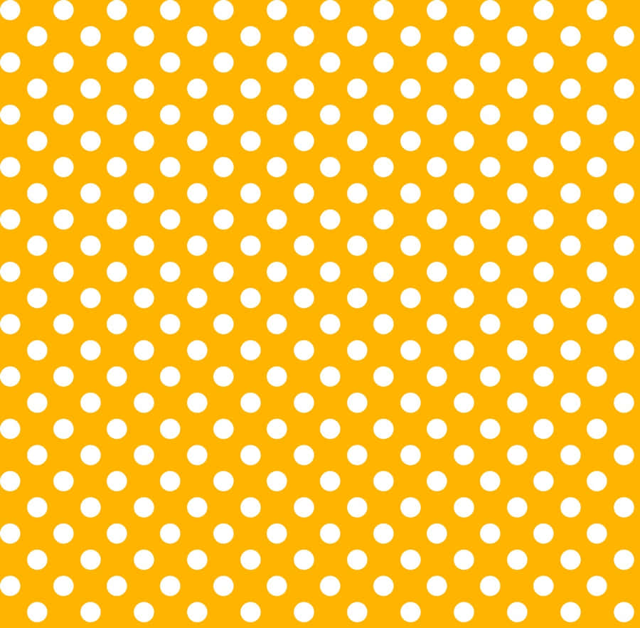 Vibrant Yellow Polka Dot Background Wallpaper