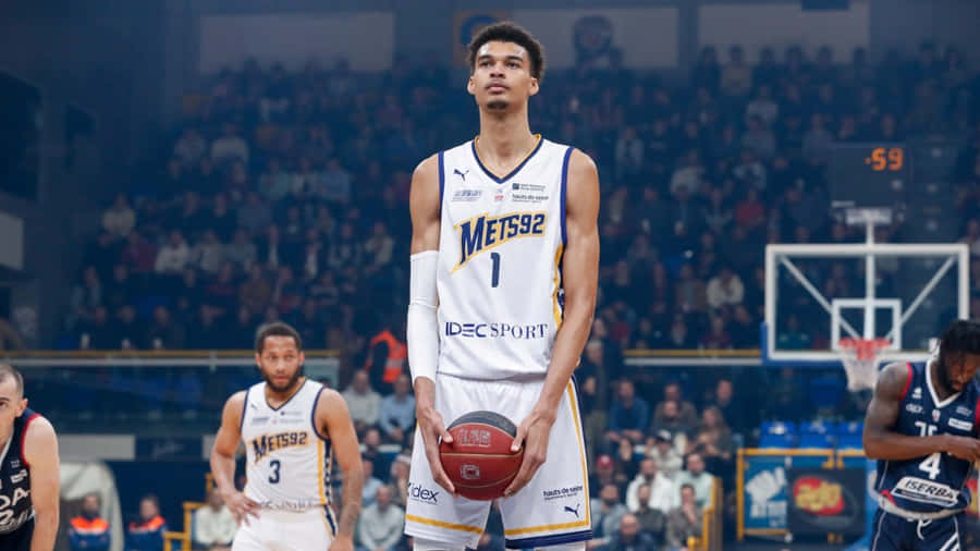 Victor Wembanyama Basketball Game Presence Wallpaper