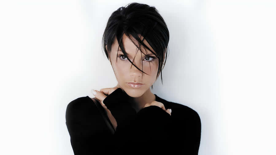 Victoria Beckham Iconic Fashion Portrait Wallpaper