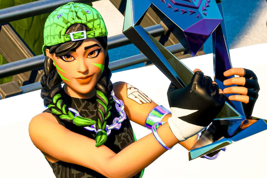 Victorious Gamer Holding Trophy Wallpaper