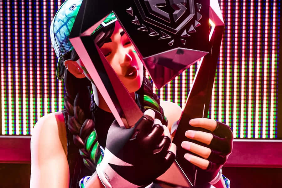 Victorious Gamer Holding Trophy Wallpaper