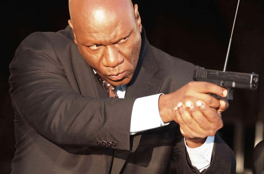 Ving Rhames Posing In A Black Suit And Tie. Wallpaper