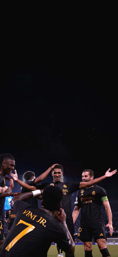 Vinicius Jr Celebrationwith Teammates Wallpaper
