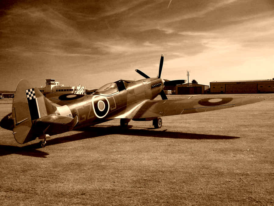 Vintage Airplane Soaring In The Blue Sky Wallpaper