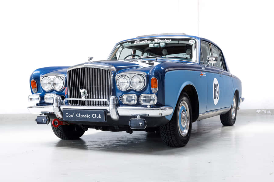 Vintage Bentley T1 Cruising The City Streets Wallpaper