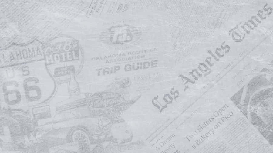 Vintage Black And White Newspaper On Table Wallpaper