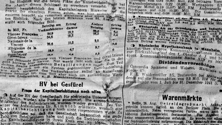 Vintage Black And White Newspaper On Wooden Table Wallpaper