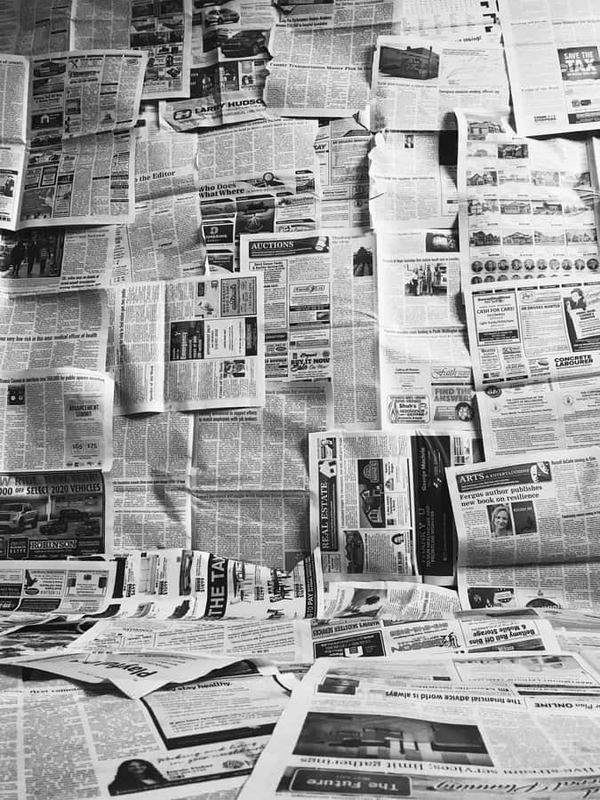 Vintage Black And White Newspaper Stacks Wallpaper