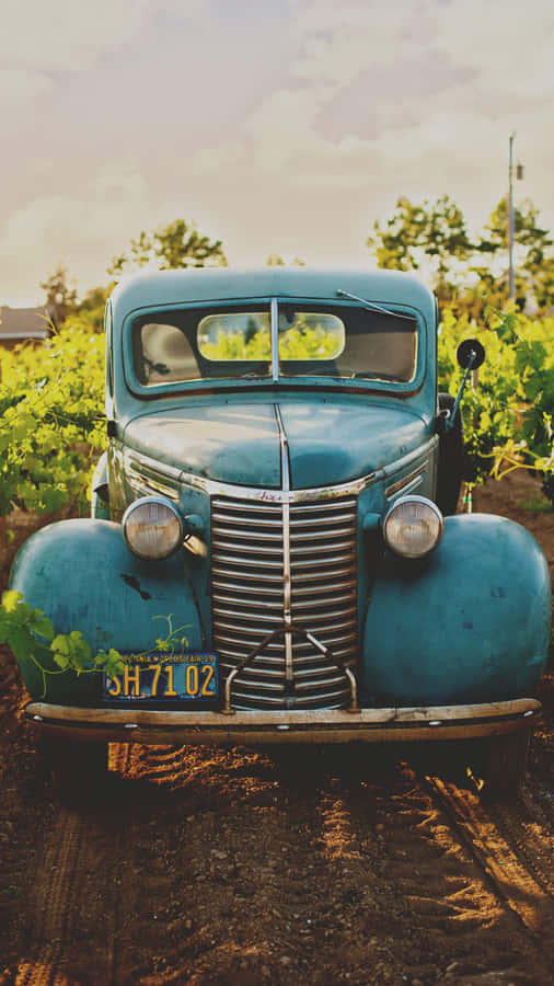 Vintage Car In Field Iphone Wallpaper