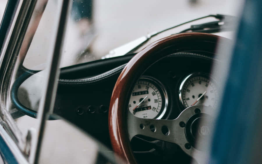 Vintage Car Steering Wheeland Dashboard Wallpaper