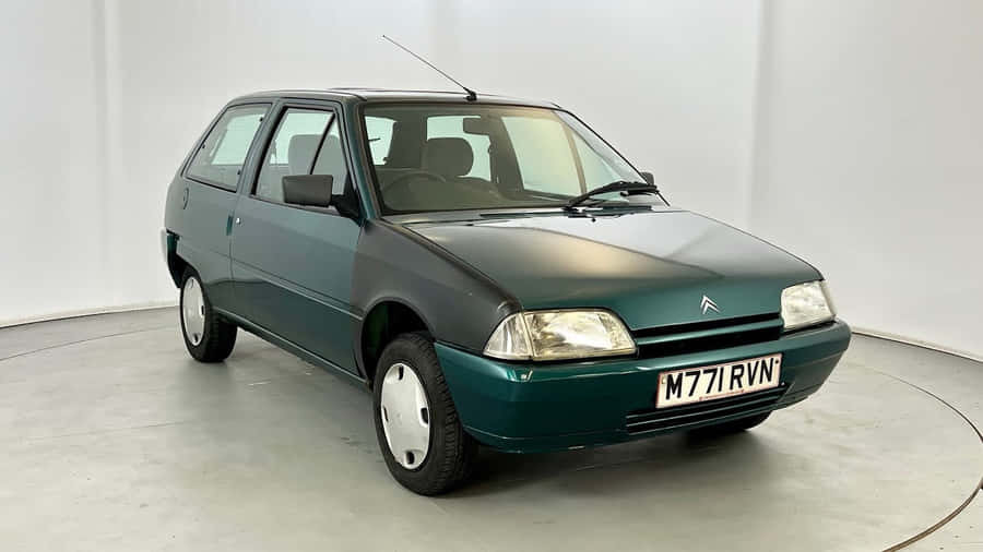 Vintage Citroen A X Green Hatchback Wallpaper