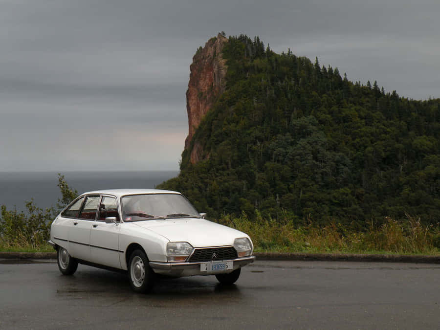 Vintage Citroen G S Near Cliffside Wallpaper