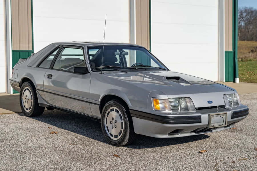 Vintage Ford Mustang S V O Side View Wallpaper