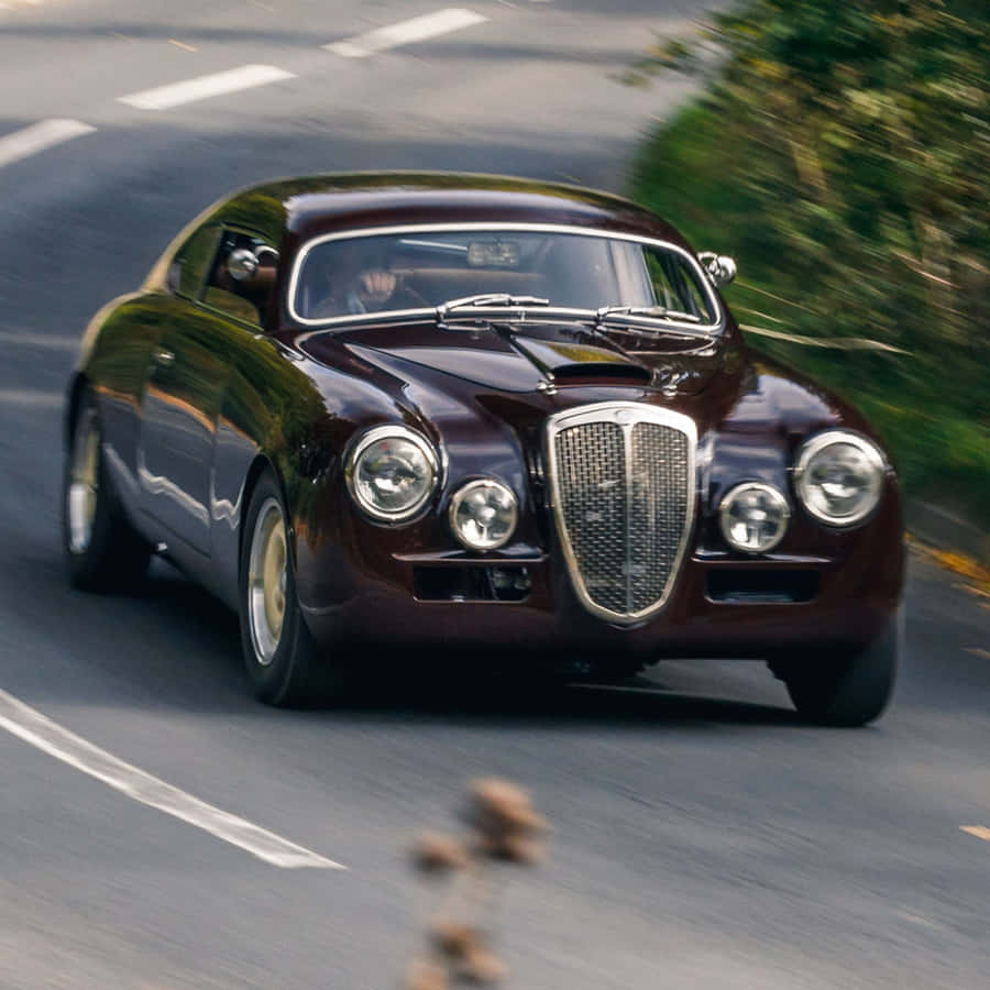 Vintage Lancia Aurelia Motion Wallpaper