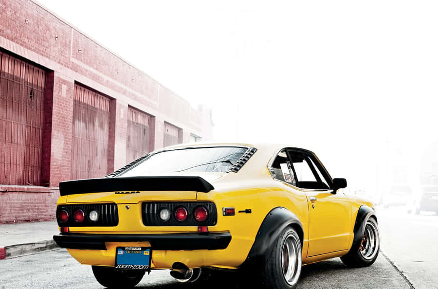 Vintage Mazda Rx-3: Classic Speed And Style Wallpaper