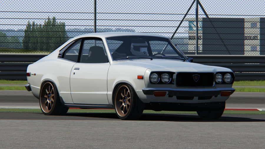 Vintage Mazda Rx-3 In Pristine Condition Wallpaper