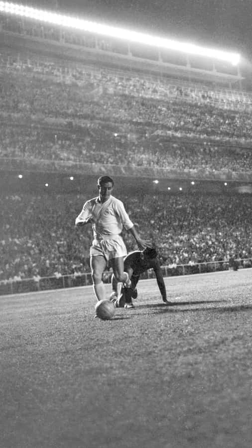 Vintage Soccer Player Stadium Night Game Wallpaper