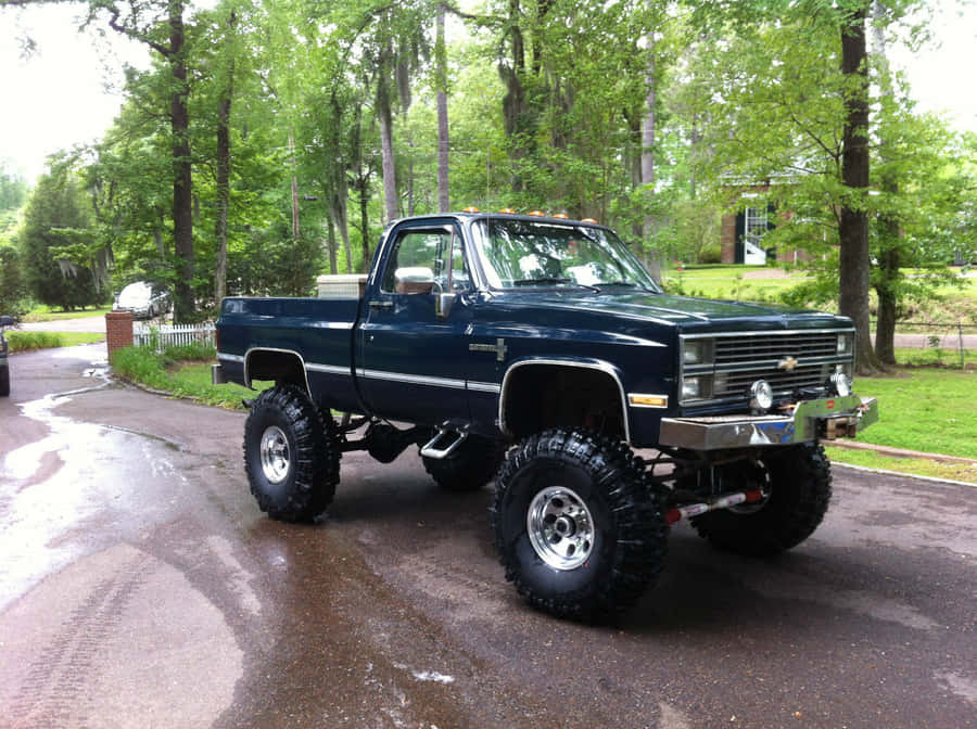 Vintage Square Body Truck In Pristine Condition Wallpaper