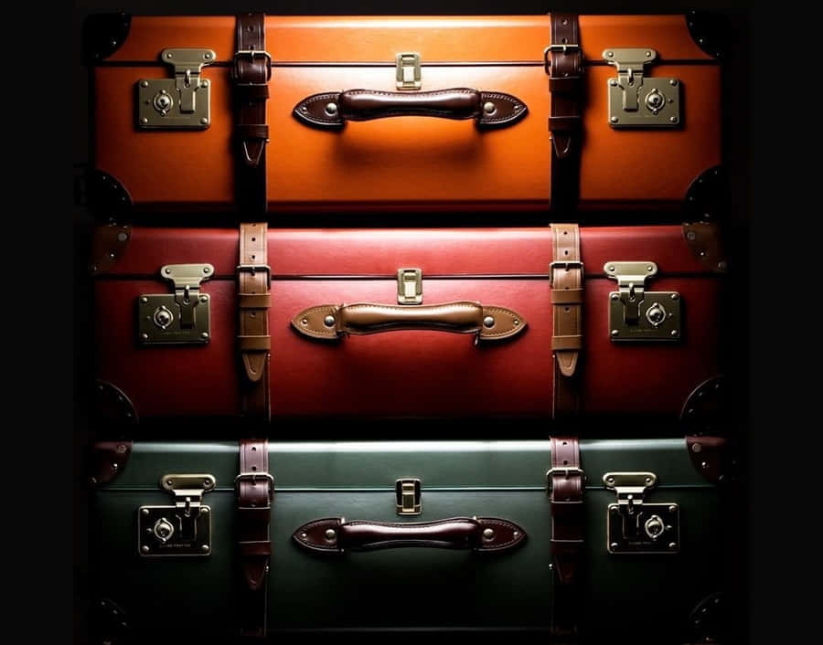 Vintage Suitcase Stack Display Wallpaper