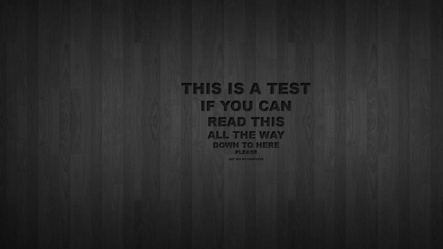 Vision Test On Dark Grungy Wooden Background Wallpaper