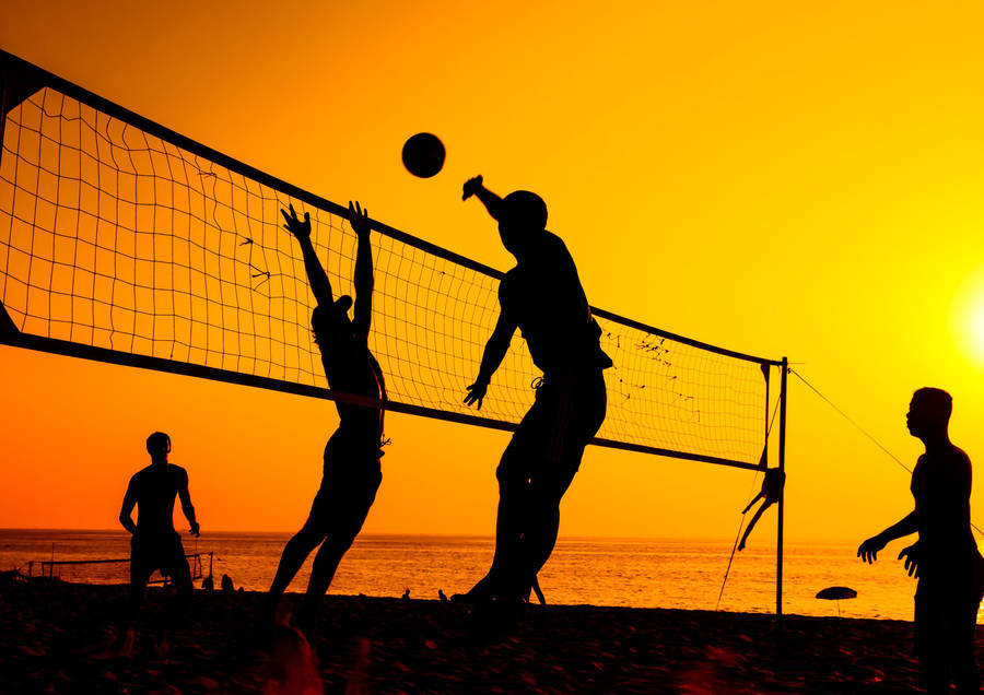 Volleyball 4k Bright Orange Sunset Wallpaper