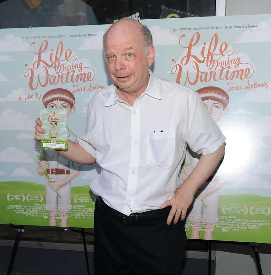 Wallace Shawn Standing In A Pose Wallpaper