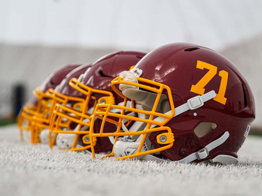 Washington Football Team In Action On The Field Wallpaper