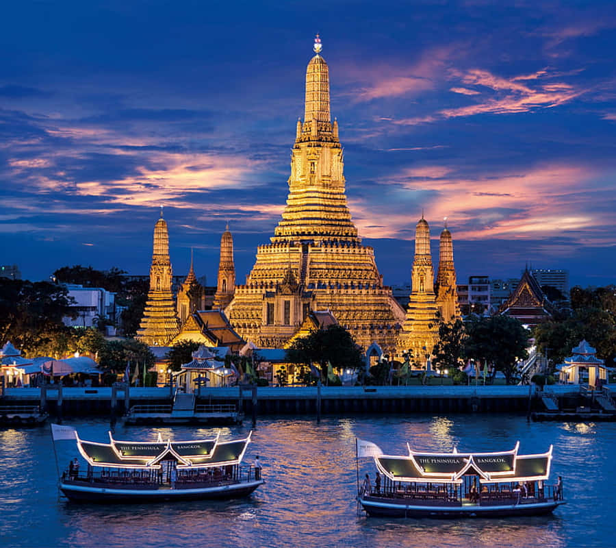 Wat Arun Against Blue Sky Wallpaper