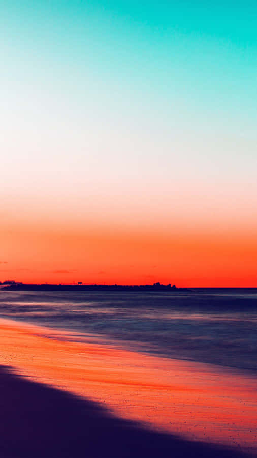 Watch The Sunset Over A Secluded Beach With An Iphone Wallpaper